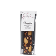 Spring Season Dark Mørk chokolade Amazonas 61%, Amber Classic-chokolade, krokant af Piemonte-hasselnødder og rabarberdrys.